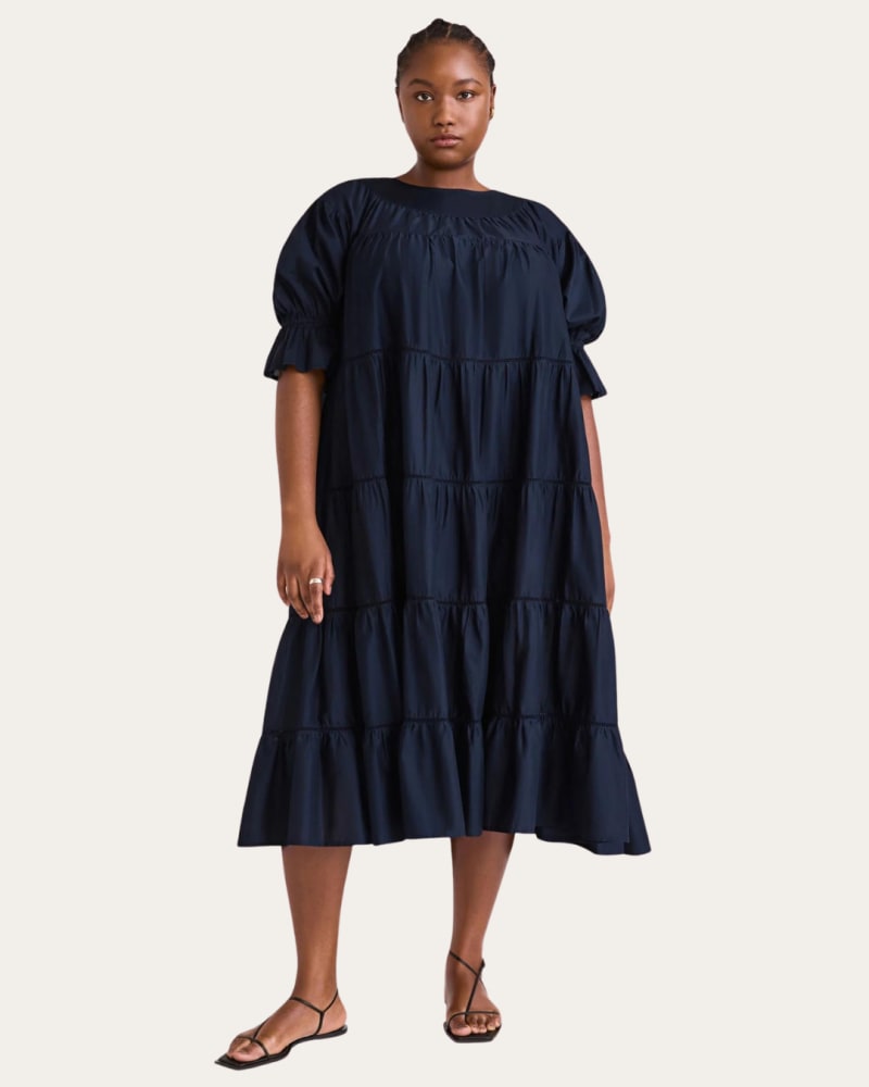 Front of a model wearing a size XL Paradis Dress in Navy by Merlette. | dia_product_style_image_id:323543